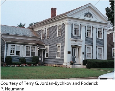   -The type of house pictured here is a(n) : A)  saddlebag house B)  dogtrot house C)  upright and wing house D)  shotgun house