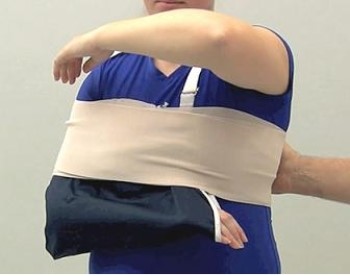 The technique demonstrated in this diagram would be the most appropriate for which of the following injuries?   A)  Injury to the middle deltoid B)  Rotator cuff injury C)  Shoulder dislocation D)  Sprain of the acromioclavicular joint E)  Injury to the coracobrachialis
