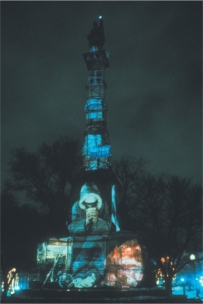   Krzysztof Wodiczko's The Homeless Projection 2 (figure 21.16A)  is an example of Postmodern art using diversity of media and a reference to prior work in order to: A)  Reject a story of art B)  Question the originality of ideas C)  Protest a social concern D)  Deconstruct an idea