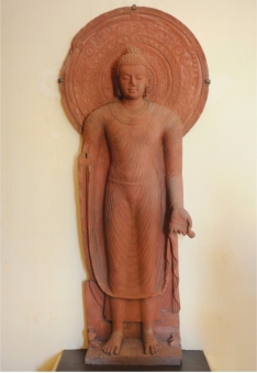   Why do depictions of the Buddha from the second century CE, such as one by Yasadinna showing a standing Buddha (figure 18.11) , show him in bodily form? A)  Art needed to address the Indian love for sensuality and decoration B)  The Buddha needed an ushnisha to signal his understanding C)  Buddhists were hoping to appeal to those who looked to the old ways D)  People wanted images of the Buddha that they could worship
