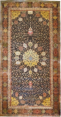   What is one interpretation for what the symbols on the design of the Ardabil Carpet (figure 16.24)  represent? A)  The garden of Eden B)  The koran C)  The mihrab in a mosque D)  The ceiling of a mosque