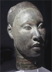   How is the head of an oni from the Yoruba culture (figure 16.11) both similar to other traditional African art and different?