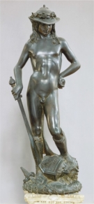     Michelangelo's David (figure 15.14A)  is more Classically inspired than Donatello's David (figure 15.10) , because: A)  It is marble B)  It is idealized C)  It is for the city of Florence D)  It shows David before the fight
