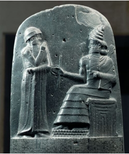   The Babylonian ruler Hammurabi had the relief sculpture on the upper part of his stele (figure 13.14)  made in order to: A)  Show his courage when facing lions B)  Promote his authority C)  Honor the sun god D)  Show himself as the most important figure in the sculpture