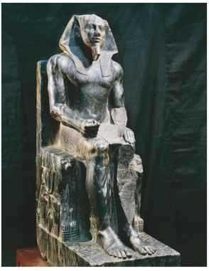     Pharaoh Khafre's sculpture (figure 13.20)  and the innermost coffin of Tutankhamun (figure 13.23)  look very similar, even though they were made over a thousand years apart. This is because: A)  Ka sculptures were a resting spot for the pharaoh's soul B)  Consistent conventions were believed to promote order C)  The sculptures ensured happiness in the afterlife D)  The sculptures depicted hieroglyphs