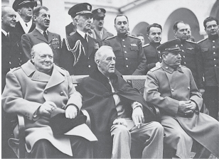   -This image of Churchill, Roosevelt, and Stalin at Yalta represents A)  One of the face-to-face meetings of the three leaders during the war B)  A pre-war negotiation of the alliance between the US, USSR, and UK. C)  A celebration of the end of World War II D)  An attempt at appeasing Hitler's desire for territory through a mutual conference