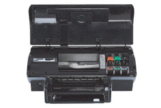  A(n)  ____printer like the one in the accompanying figure has a print head that sprays ink onto paper to form characters and graphics. A)  ink-jet B)  laser C)  toner D)  photo