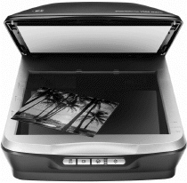   When you have an existing printed image, such as a photograph, you can use a ____ (like the one shown in the figure above) to convert the image into a bitmap graphic. A) printer B) copier C) scanner D) computer