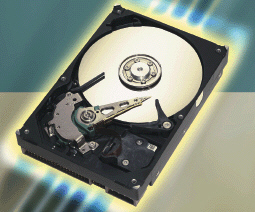   Figure 1-3 With current storage devices, like the CD and CD drive shown in Figure 1-3, a computer can transfer data quickly from storage to memory, process it, and then store it again for future use.