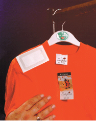 <strong> Figure 5-4 As shown in Figure 5-4, ____ is a technology that uses radio signals to communicate with a tag placed in or attached to an object, an animal, or a person.</strong> A) OCR B) RFID C) OMR D) TMR
