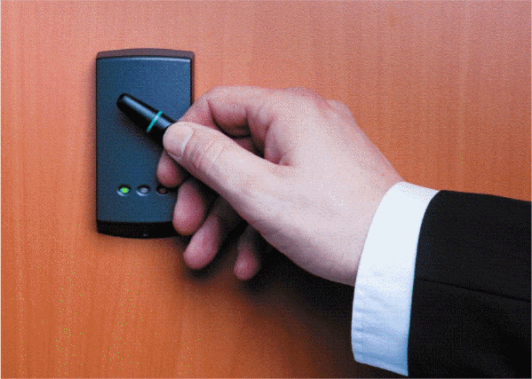   Which of the following is a technology, as shown in the accompanying figure, that uses radio signals to communicate with a tag placed in or attached to an object, an animal, or a person? A)  OCR B)  RFID C)  OMR D)  TMR