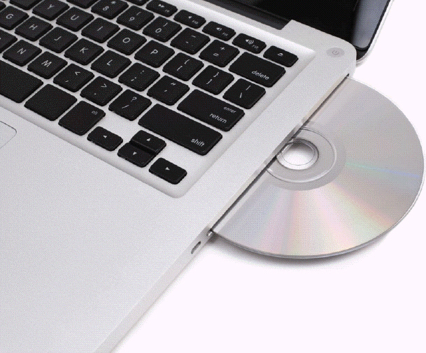   Which of the following is a good practice to follow to avoid scratching or damaging a disc like the one in the accompanying figure? A)  Hold the disc by its edges. B)  Stack the discs whenever possible. C)  Touch the underside of a disc. D)  Do not worry about exposing discs to any type of contaminant.