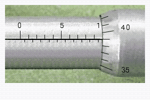 Read the measurement shown on the metric micrometer.   __________ mm