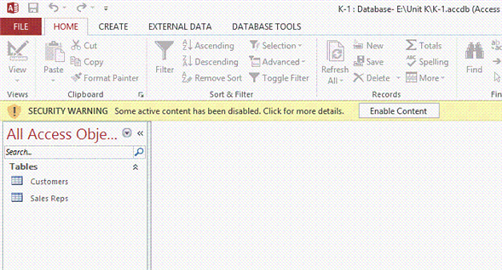   In the accompanying figure, what is stopping the user from working in this database? A)  Security warning B)  Wrong software version C)  There is no relationship between the tables D)  The file is locked