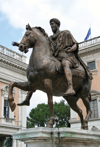  Which statement about the Equestrian Statue of Marcus Aurelius is correct? A) Marcus Aurelius scandalized Rome by making this horse a member of the Senate. B) Marcus Aurelius wears the traditional clothes of a Roman emperor. C) The statue was crafted from hollow-cast bronze. D) Marcus Aurelius is emphasizing his military prowess in this sculpture.