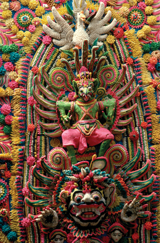   Which statement about Sarad offering is correct? A) Sarad offering was built to be the permanent focus of the temple space. B) Balinese priests created Sarad offering from rice dough. C) Balinese families created Sarad offering from rice dough. D) Sarad offering can be considered an equestrian statue.