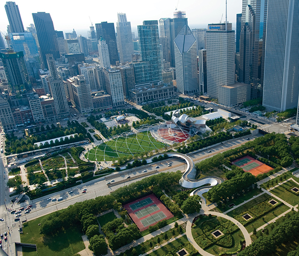 ​   What is Millenium Park 's context within Chicago? A) It floats on top of Lake Michigan. B) It is a compact urban park nestled in the center of the Loop. C) It is a large suburban park, offering a relief from urban congestion. D) It's large in scale and situated above a train station.