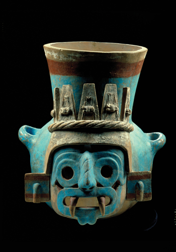 ​   What do the frontal and symmetrical qualities of the Tlaloc Vessel symbolize? A) Ambiguity B) Music C) Formality D) Playfulness