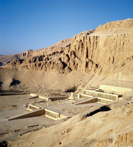 ​   How does the Mortuary Temple of Hatshepsut reflect public opinion? A) It depicts only female deities to emphasize Hatshepsut's unusual status as female pharaoh. B) It omits military imagery because that was not considered appropriate for women in Egyptian society. C) It was built to honor her, but later was defaced by her successors. D) As one of the great pharaohs of ancient Egypt, her temple continued to be honored long after her death.