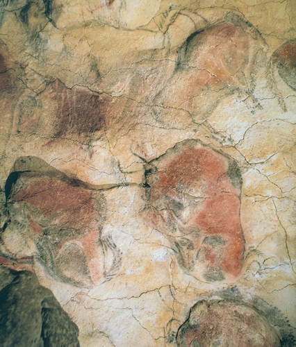 ​   What unifying device is missing from this cave painting at Lascaux? A)  Colored silhouette B)  Blown pigment C)  Profile D)  Ground line