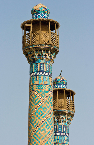 <strong> What type of tilework covers this minaret of the Friday Mosque at Isfahan?</strong> A) Cuerda seca tilework B) Puzzle tilework C) Mosaic tilework D) Lantern tilework