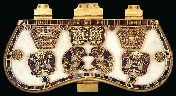 <strong> The two groupings of a man standing between two lions on the Sutton Hoo purse cover represent a composition type familiar from where?</strong> A) Carolingian manuscripts B) the Ancient world C) Monastic sculpture D) Egypt