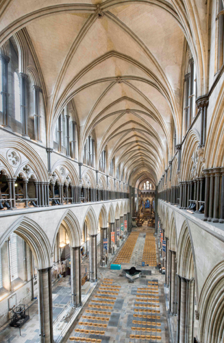 <strong> Which feature of the nave of Salisbury Cathedral is not French Gothic in character?</strong> A) Pointed arches B) Compound piers C) Color contrast D) Four-part rib vaults