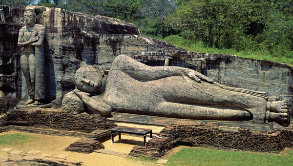 <strong> What is the location of this colossal sculpture of the Buddha?</strong> A) Angkor, Cambodia B) Gal Vihara, Sri Lanka C) Sarnath, India D) Ajanta, India