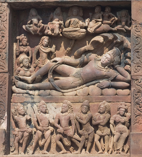 <strong> The creative aspect of which Hindu god is depicted in this sandstone relief?</strong> A) Vishnu B) Shiva C) Buddha D) Devi