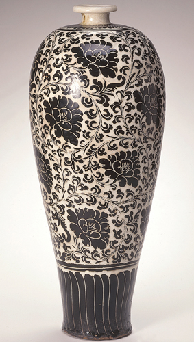 <strong> What technique was used to decorate this vase?</strong> A) Stamping B) Rubbing C) Sgraffito D) Lalitsana