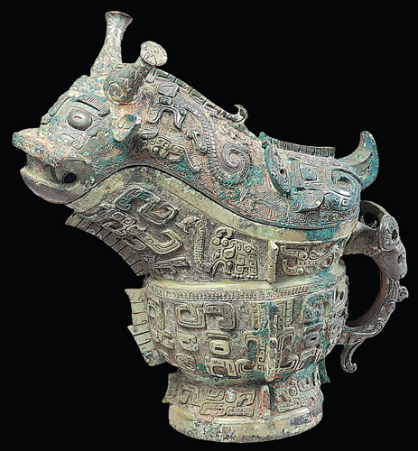 <strong> Under which dynasty were these elaborate cast-bronze vessels produced?</strong> A) Southern Song B) Six Dynasties C) Shang D) Tang