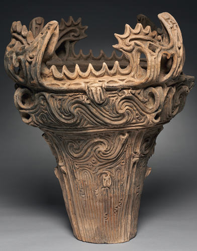 <strong> Which artistic period produced this flame-style vessel?</strong> A) Heian B) Kofun C) Kamakura D) Jomon
