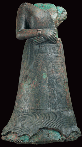 <strong> What accounts for the great weight of this statue?</strong> A) The king wanted to consolidate his wealth in one object. B) The patron wanted it to be a permanent and immovable dedication. C) The artist wanted it to be a permanent and immovable dedication. D) The metal used to create it is extremely dense and heavy.