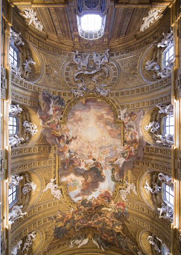 <strong> How does Giovanni Battista Gaulli depict Jesus in his ceiling fresco Triumph of the Name of Jesus for Il Gesù?</strong> A) Chi-rho symbol B) IHS monogram C) Pantokrator D) In a mandorla
