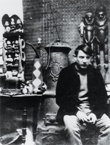 ​   Which early 20th-century art collector appears in this photograph by Frank Gelett Burgess? A)  Georges Braque B)  Leo Stein C)  Henri Matisse D)  Pablo Picasso
