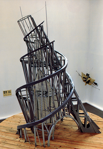 <strong> What was the intended function of Vladimir Tatlin's Monument to the Third International ?</strong> A) Monument to Communism B) Church tower staircase C) Armature for colossal statue D) Government building
