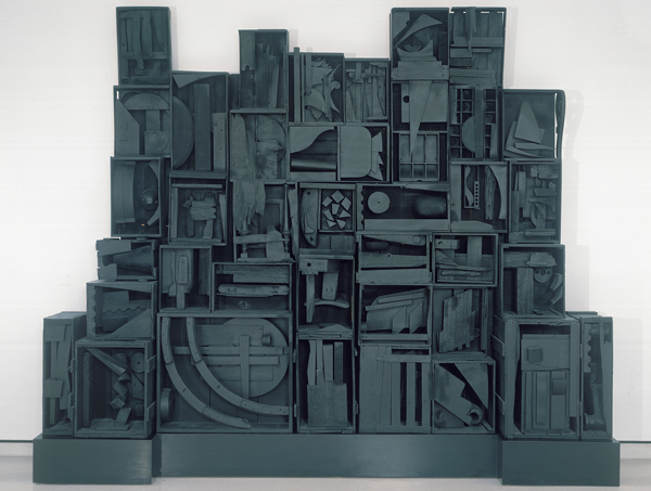 <strong> This monochromatic sculpture, incorporating found objects in frames, by Louise Nevelson is meant to evoke what mood?</strong> A) Religious reverence B) Mystery and magic C) Order and rhythm D) Permanence and solidity