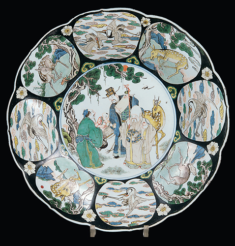 <strong> What is the symbolic meaning of the images of the spotted deer and pine trees around the rim of this bowl?</strong> A) Material wealth B) Long life C) Good luck D) Peace and serenity
