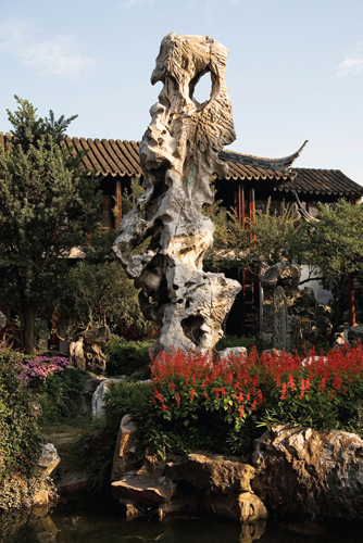 <strong> Where in Suzhou is this rock formation, known as the Guanyun (Cloud Crowned) Peak?</strong> A) Lion Grove Garden B) The Master of Nets Garden C) Lingering Garden D) Humble Administrator Garden