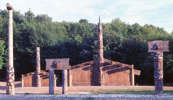 <strong> Which Native American artist is responsible for this re-creation on Queen Charlotte Island of a Haida village and its totem poles?</strong> A) Julian Scott B) Jaune Quick-to-See Smith C) Karl Bodmer D) Bill Reid