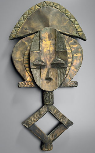 ​   Why do sheets of polished copper and brass cover the wooden mbulu ngulu figures made by the Kota? A)  Indicate wealth of the deceased B)  Provide surface for written stories C)  Repel evil via the shine of the metal D)  Protect the statue from deterioration