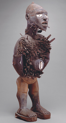 ​   The large size of this Kongo power figure indicates that its exceptional protective abilities were meant to assist whom? A)  Deceased ancestors B)  Entire community C)  Current group leader D)  Royal lineage