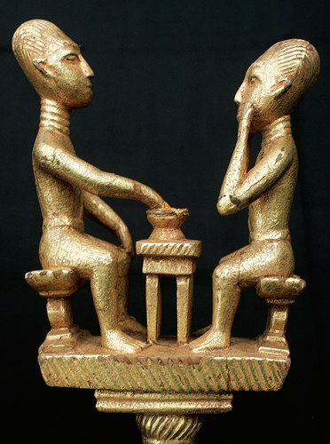 <strong> This gold-covered wooden staff was an emblem of which office?</strong> A) Chef B) Diviner C) King D) General
