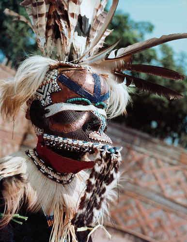 <strong> Of the three masks in Kuba masquerades that tell a story to celebrate royal ancestors, which character is a commoner who opposes the king's power?</strong> A) Woot B) Bwoom C) Ogoga D) Toga