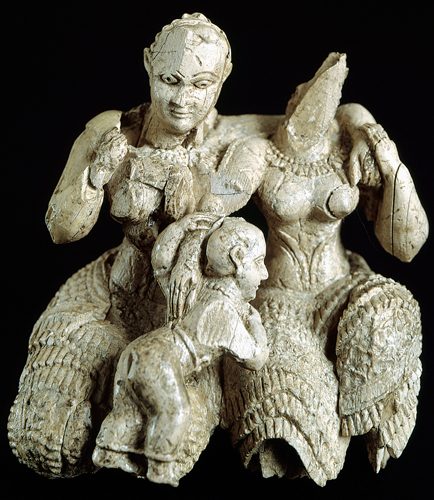 ​   Which component of this object, found at Mycenae, indicates it was created by a Minoan artist? A)  Warlike character B)  Garments C)  Material D)  Findspot