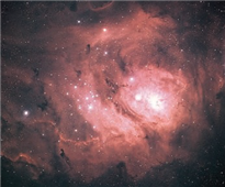 <strong> In the above image of a glowing gas cloud, you mainly see the color pink. Which spectra would you mostly expect from this gas cloud?</strong> A) absorption B) continuous C) emission D) blackbody
