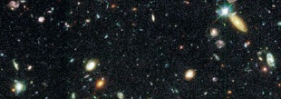    The blue sharp point of light with diffraction spikes in the upper right corner of the visual + NIR image of the Hubble Deep Field, shown above, is a star in our Milky Way Galaxy.