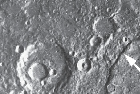   What is the arrow in the above photo pointing to on the surface of Mercury? A)  mountain B)  valley C)  crater D)  scarp