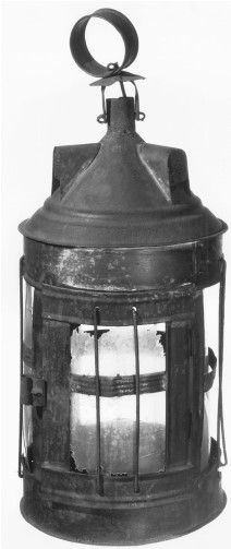 This candle lantern displays ____ windows.   A)  Bakelite B)  horn C)  shellac D)  acrylic