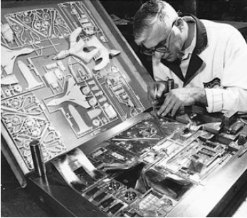 Pictured here is ____ whose work is carried out with precision.     A)  a CAD operator B)  a cooling system operator C)  a die maker D)  injector personnel